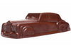 A three-dimensional chocolate molded car that resembles a Bentley.
