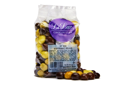 A cellophane bag of a mix of yellow and brown enrobed espresso beans..