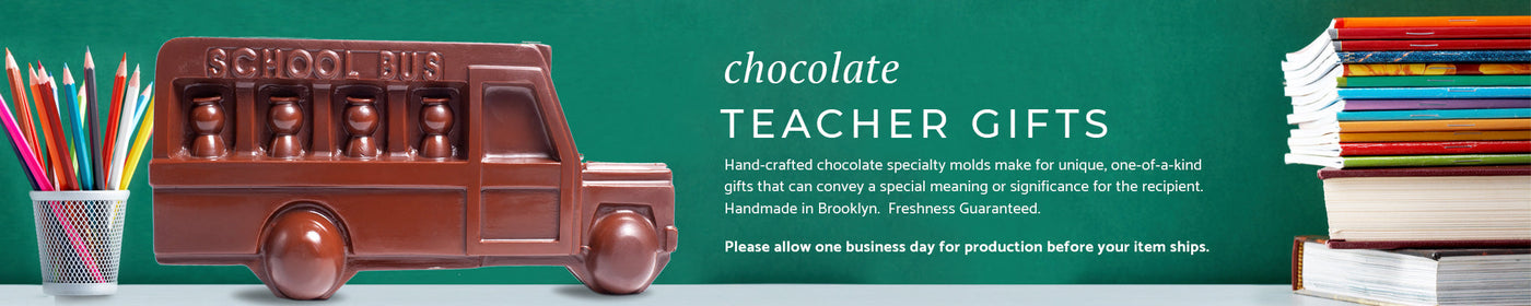 a chocolate school but with a cup holding pencils and a stack of books on a textured green background.