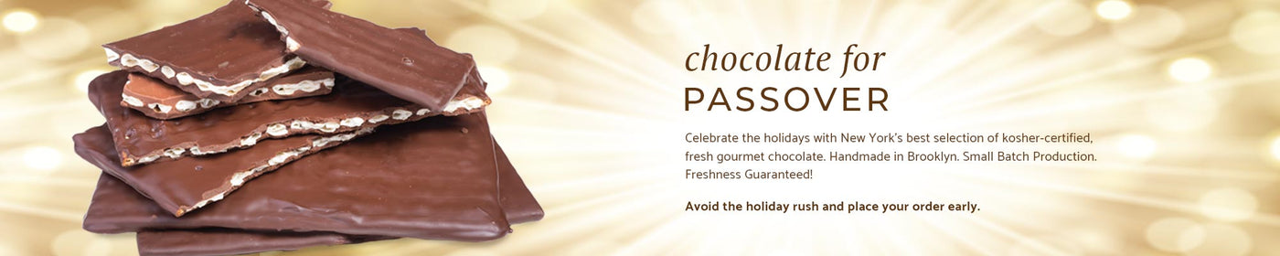 a stack of chocolate covered matzoh with a starburst yellow background