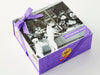 A chocolate box showing a vintage photo of the Li-Lac store tied with a satin ribbon