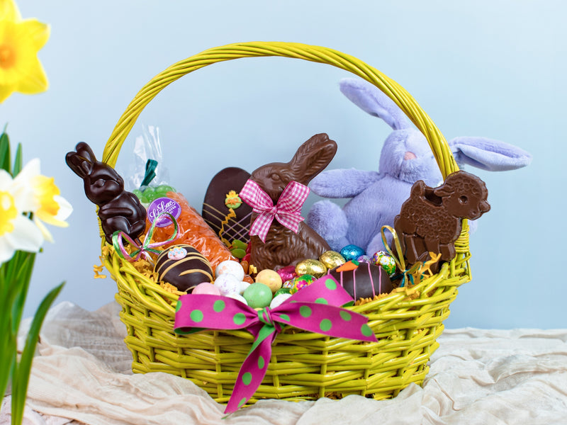 a large Easter basket filled with chocolates and candies