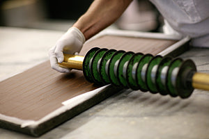 tool used to score and cut a tray of chocolate fudge