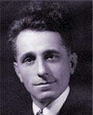 George Demetrious as a young man in a suit and tie