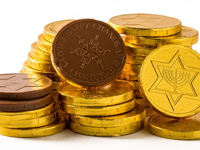 Chanukah Chocolate Gelt Coins, wrapped in foil and stamped to have Chanukah greetings on one side and a Menorah in a Star of David on the other.