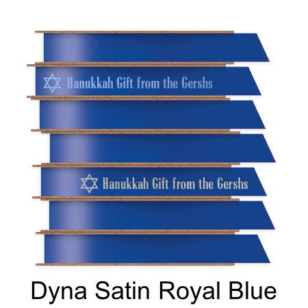 A stack of seven spools of shiny royal blue satin ribbon with custom messages printed on them in different colors. 