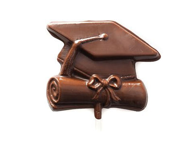 A molded chocolate Graduation Cap with tassel & rolled up diploma.