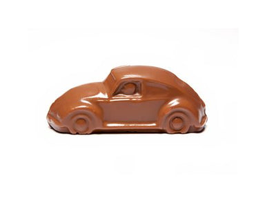 A molded milk chocolate Volkswagen beetle car.