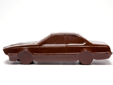 A chocolate molded car that looks like a 1970&