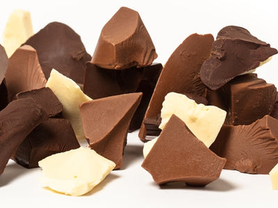 Milk, dark and white chocolate are broken up into rustic chunks.