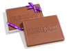 8 oz custom molded Chocolate Bar with your logo or image. It comes in a wite two piece box. This example has the TravelZoo logo embossed on the bar.
