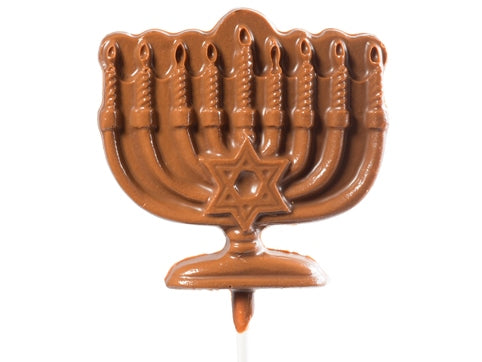 Molded chocolate menorah has a Star of David in the center and is on a lolly stick.