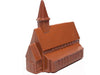 A chocolate molded church building with a pitched roof and bell tower.