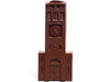 A chocolate molded brick building with a tall clock tower.