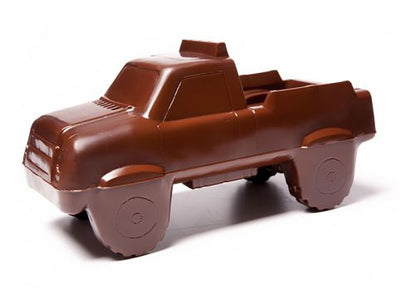 A three-dimensional chocolate molded Monster Truck style vehicle..