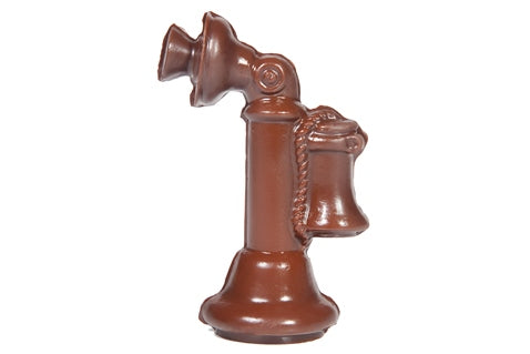 An old-fashioned candlestick phone molded out of milk chocolate.