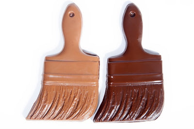 Chocolate molded into the shape of a traditional wooden handled Paint Brush.