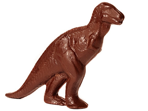 A three-dimensional chocolate molded Tyrannosaurus Rex. It stands on two legs and has tiny t-rex arms.
