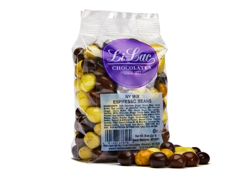 A cellophane bag of  a mix of yellow and brown enrobed espresso beans..