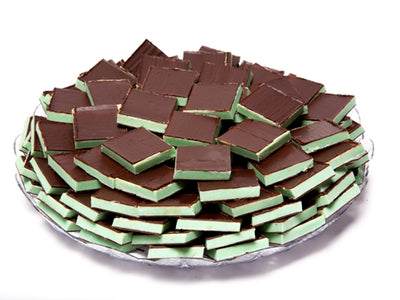 Beautiful squares of French Mints are layered artfully on a platter.