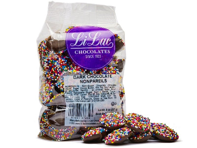 A cellophane bag of  Dark Chocolate Nonpareils.