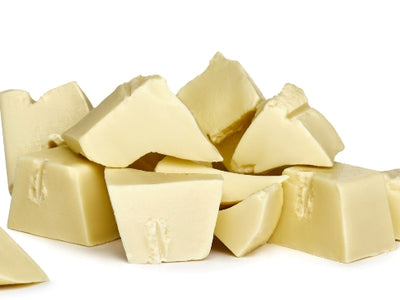 White chocolate is broken up into rustic chunks.