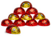 Chocolates wrapped in red and gold foil that have a decoration that makes them look like little round smiling ladybugs.