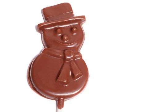 A molded chocolate snowman pop on a stick.