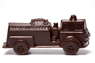 A three-dimensional chocolate molded fire ladder truck.