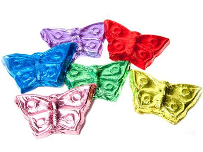 Molded chocolate butterfliies are wrapped in brightly colored foil. 