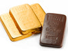 Molded chocolate Gold Bullion Bars are wrapped in shiny gold foil.