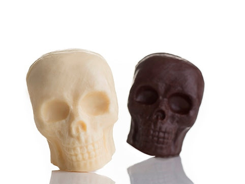Detailed molded chocolate skulls in milk or dark chocolate. 