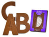Three-dimensional molded chocolate letters.