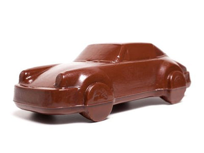 A three-dimensional chocolate molded Porsche style car.