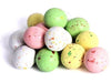 Malt balls are in pastel colors and speckled to look like bird's eggs.
